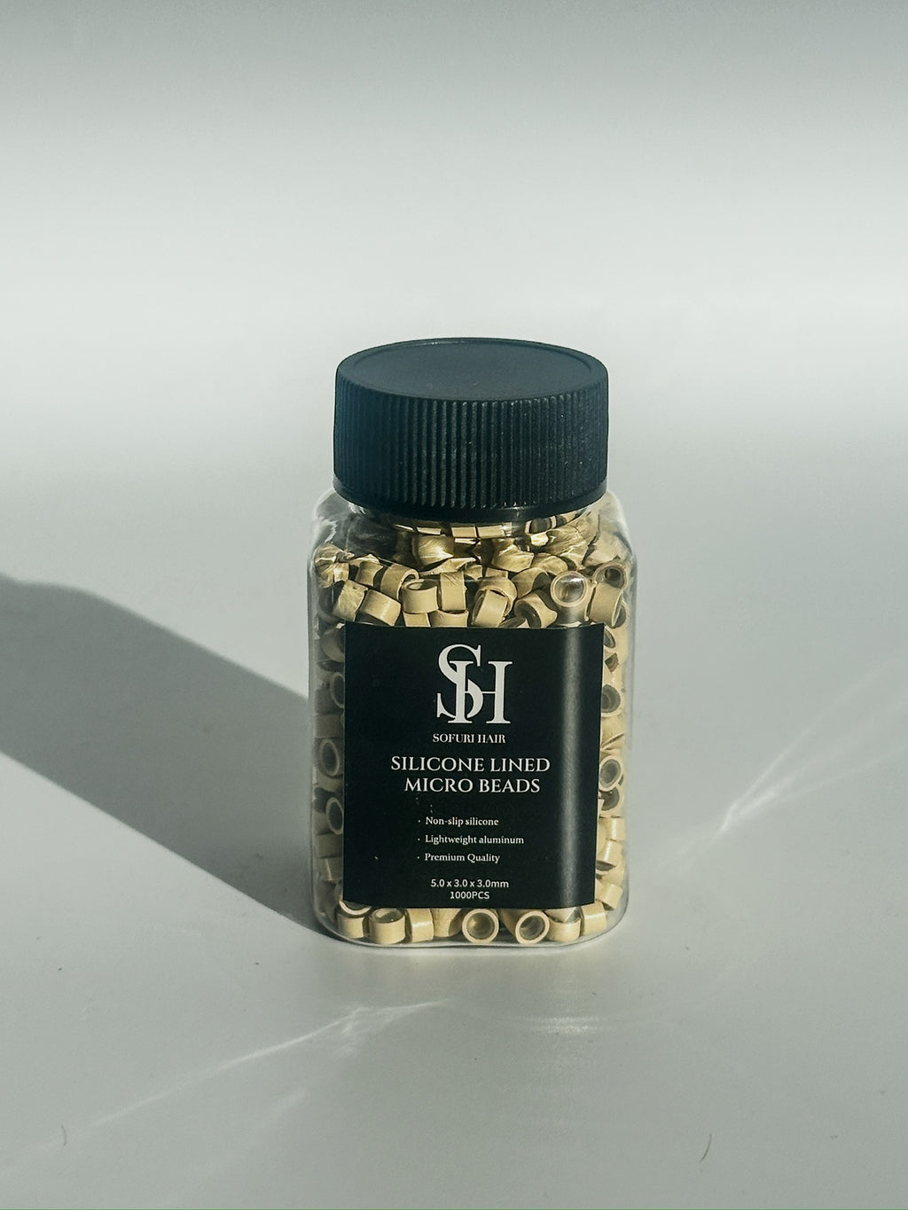 Blonde Silicone Lined Aluminum Bead